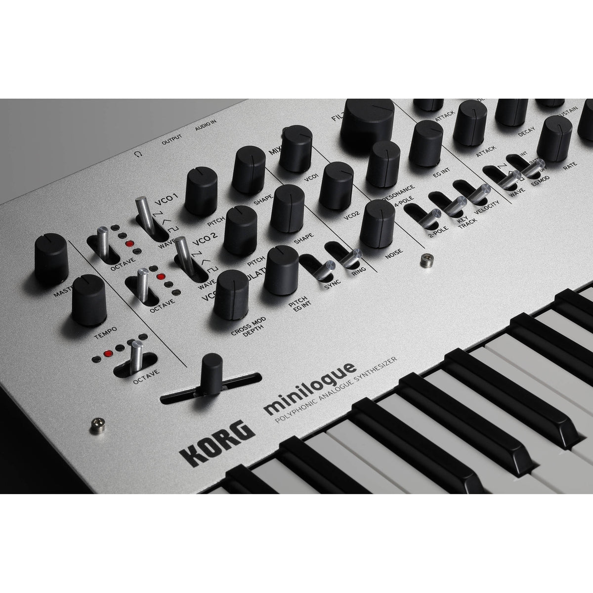 Korg Minilogue synthesizer with control knobs and keyboard, showcasing its compact design and versatile sound capabilities.