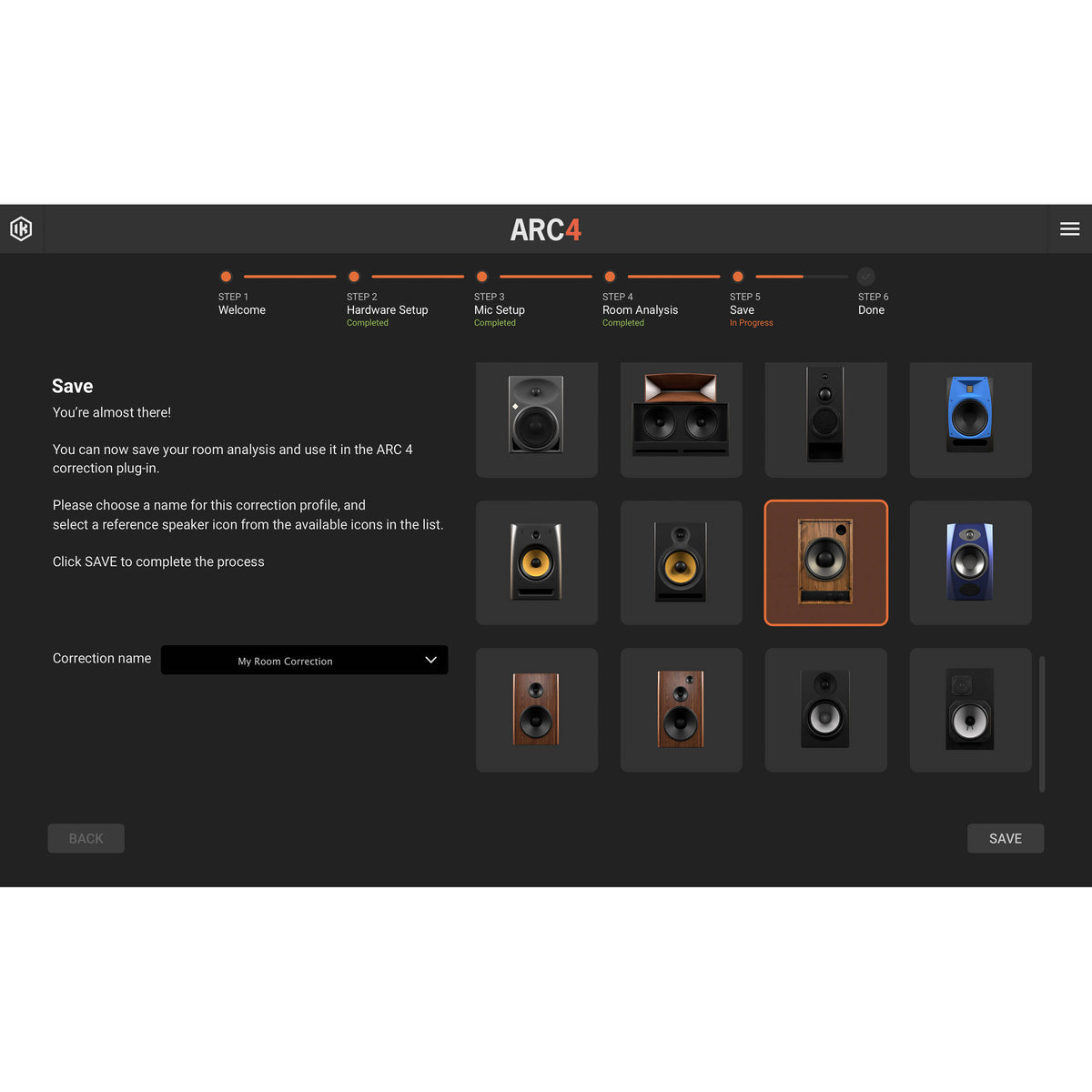 IK Multimedia ARC Studio room calibration device connected to audio equipment for accurate sound optimization.