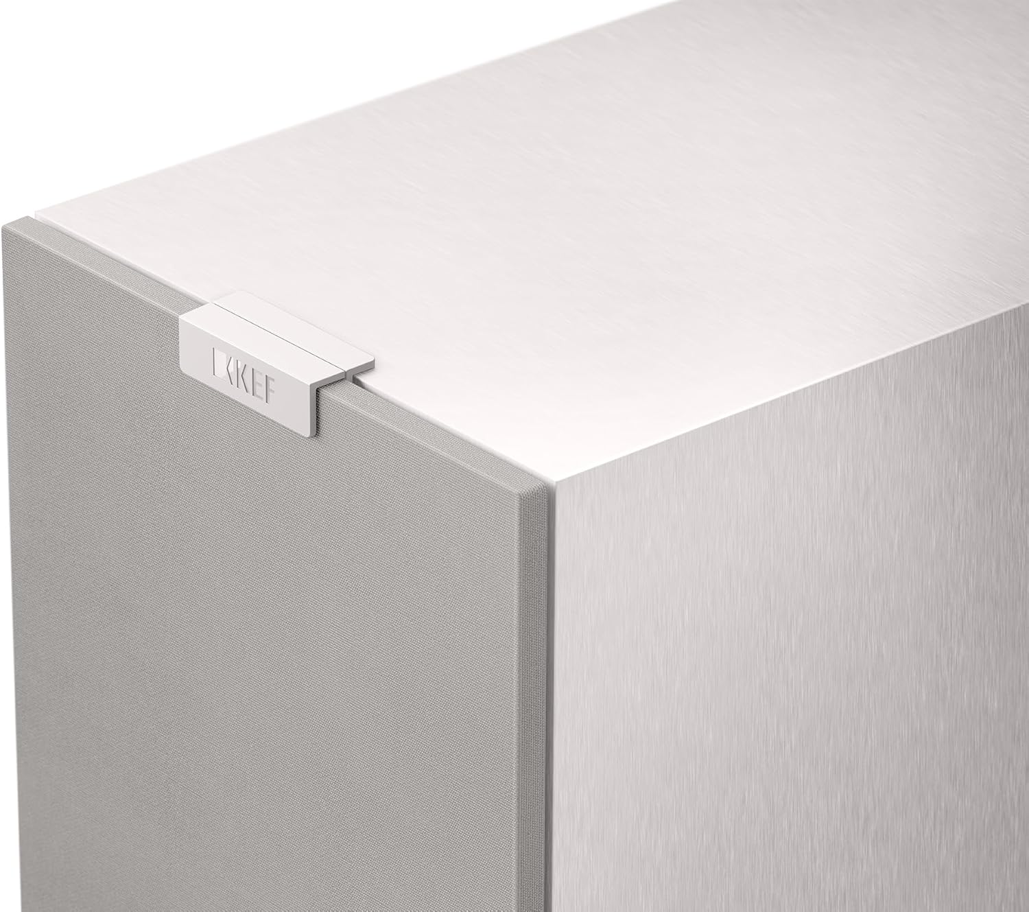 KEF Q6 Meta center speaker showing black rectangular design with dual driver units and KEF branding on the front grille.