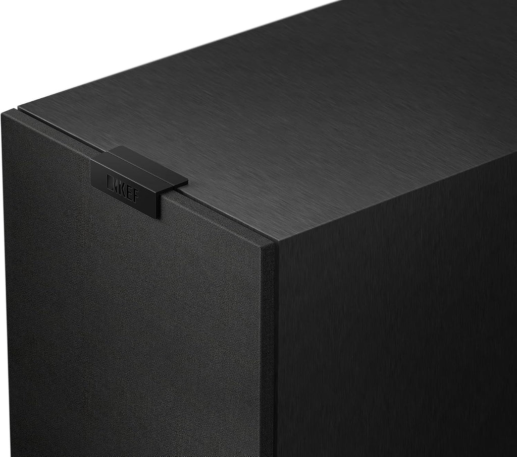 KEF Q6 Meta center speaker with sleek black cabinet and detailed speaker grille, designed for high-quality home theater audio.