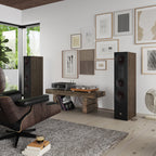 DALI Opticon 8 MK2 passive floorstanding speakers shown in a stylish living room setting, highlighting their sleek design and wood finish.