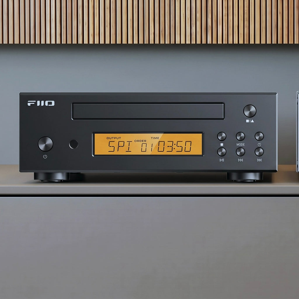 FiiO DP11 CD player in black on a living-room sideboard