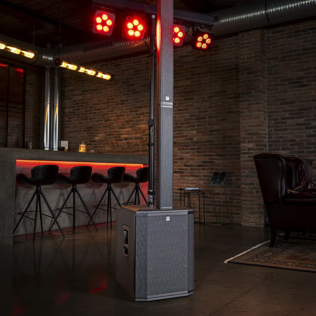 HK Audio POLAR 15 MK2 set up in a bar with stage lighting