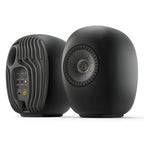 KEF LS Luxe wireless speakers in Eclipse Black, front and rear view of the pair