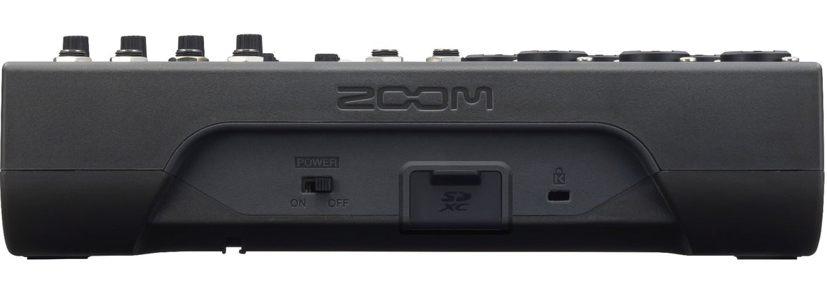 Zoom LiveTrak L-8 digital mixer with multiple input channels, sliders, and control knobs for professional audio mixing.