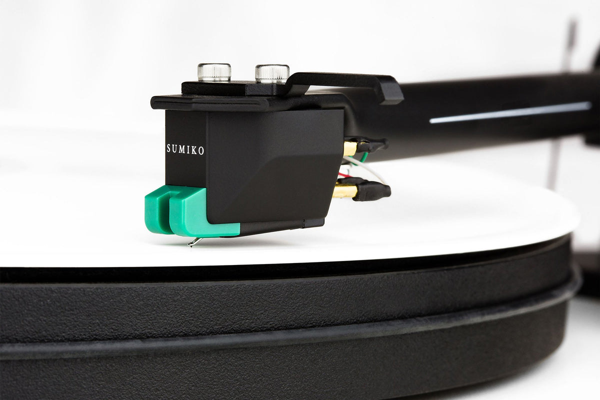 Sumiko Olympia MM phono cartridge installed on a turntable, showcasing its sleek design and high-quality build for vinyl playback.