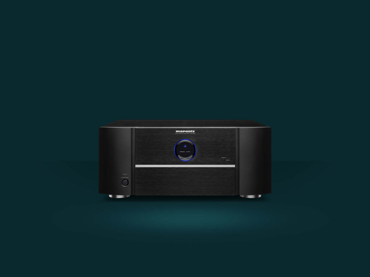 Marantz MM7055 stereo amplifier with sleek design and multiple audio input options, ideal for high-quality home audio systems.
